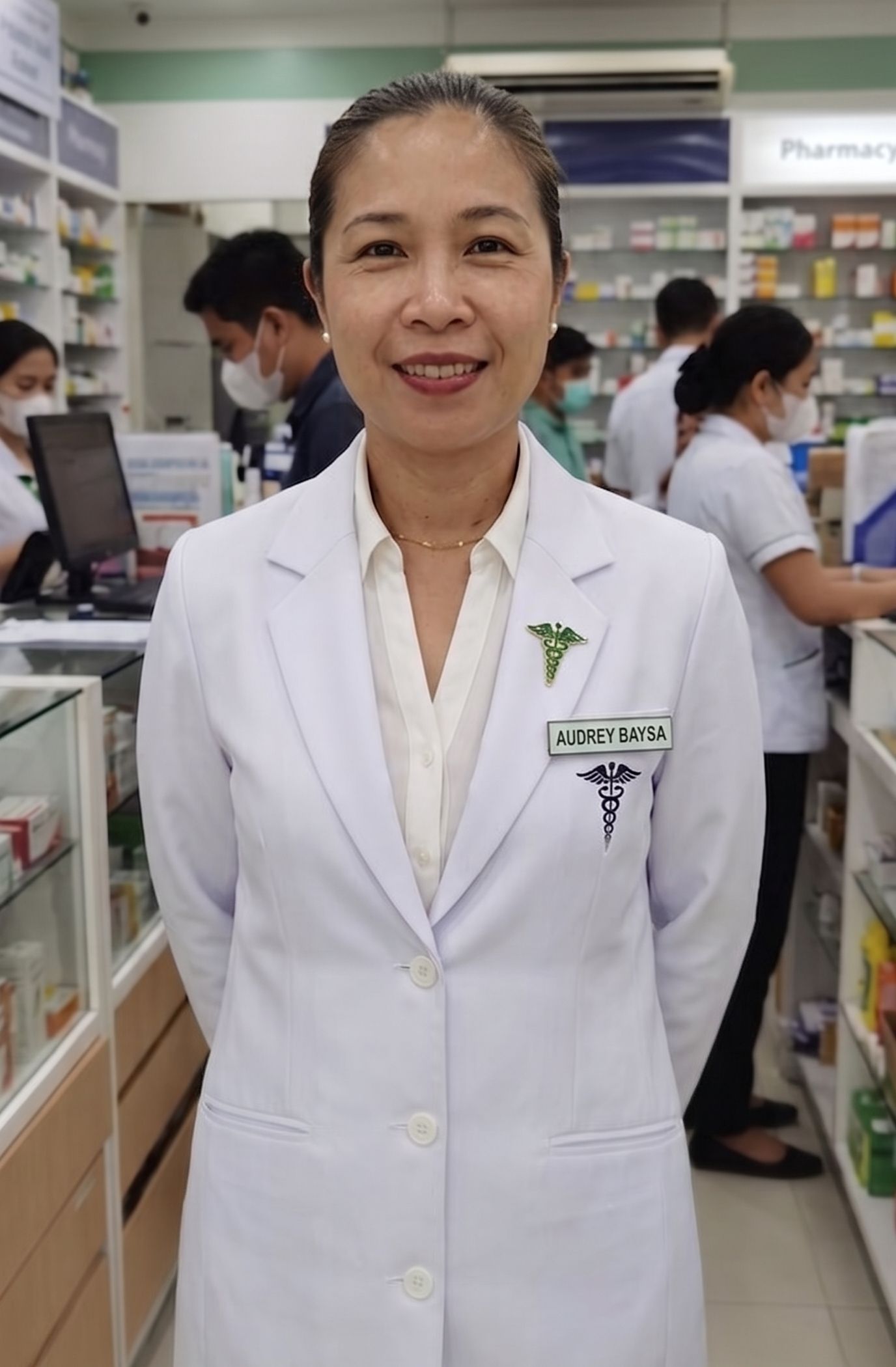 Audrey Poliran Baysa, RPh, MSc — registered pharmacist and medical reviewer for Semaglutide Dosage, photographed in a community pharmacy in Davao City, Philippines